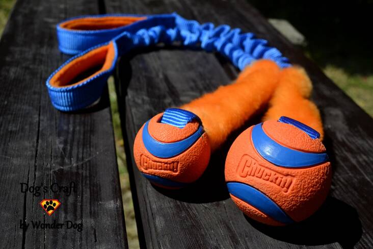 Palkkapallo Ultra Tug Amor 50cm joustokahvalla sini-oranssi Dog's Craft - Motivointipatukat, -pallot, purutyynyt - 039632 - 1